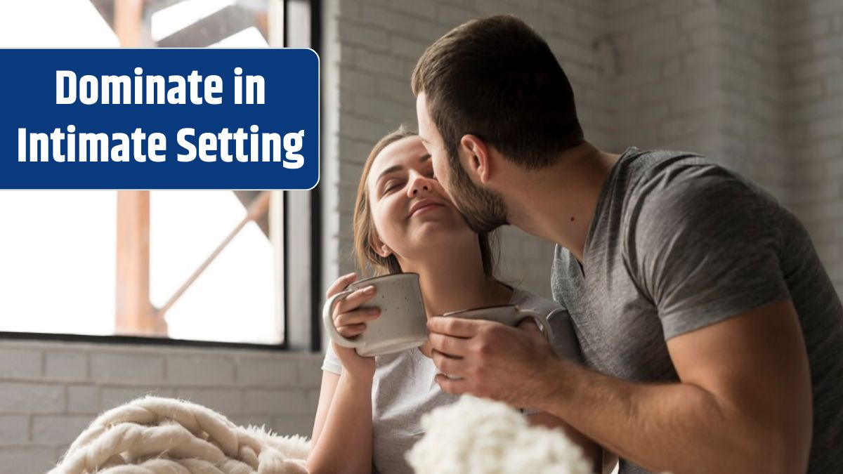 Romantic young couple having coffee in bed.